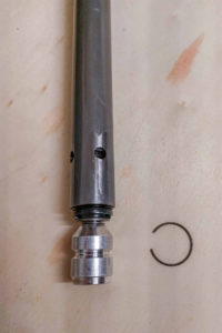 Cartridge, compression piston and circlip